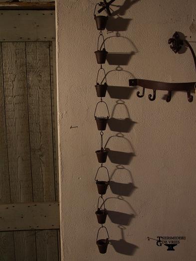 Regenpijp-overloop emmertjes